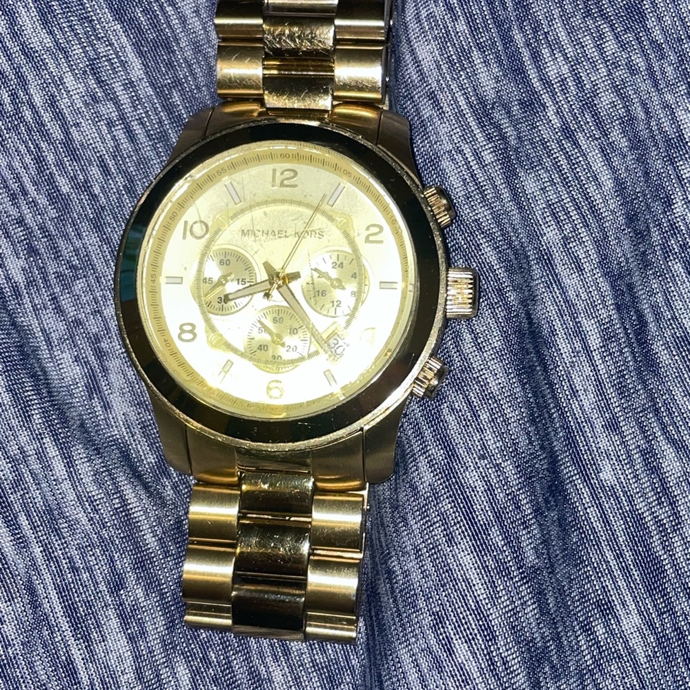 Used Michael Kors unisex gold watch